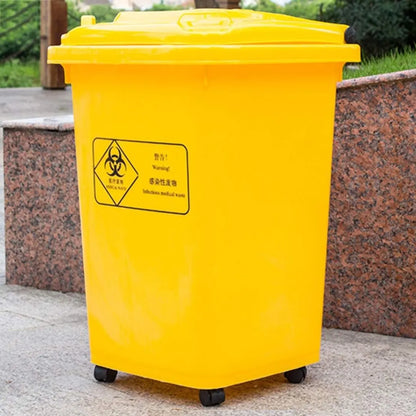 Yellow dustbin with 4 wheels